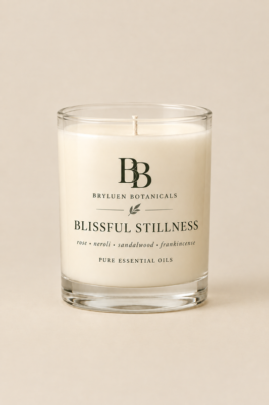 Blissful Stillness candle by Bryluen Botanicals in clear glass, unlit, with minimal transparent label