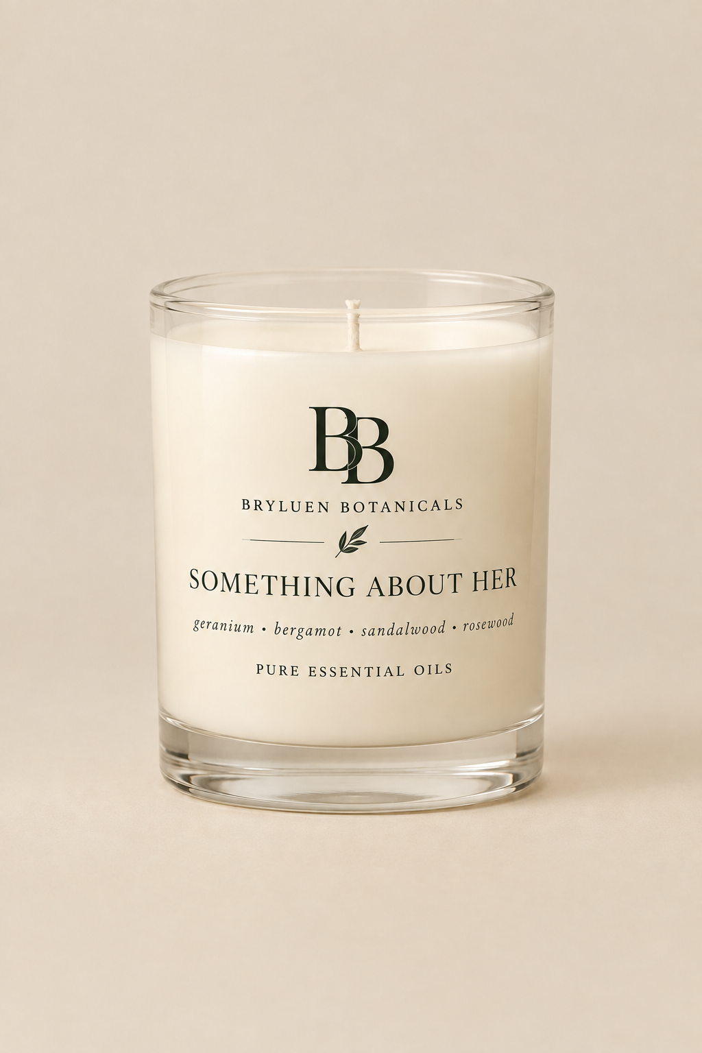 Something About Her candle by Bryluen Botanicals in clear glass, unlit, with minimal transparent label