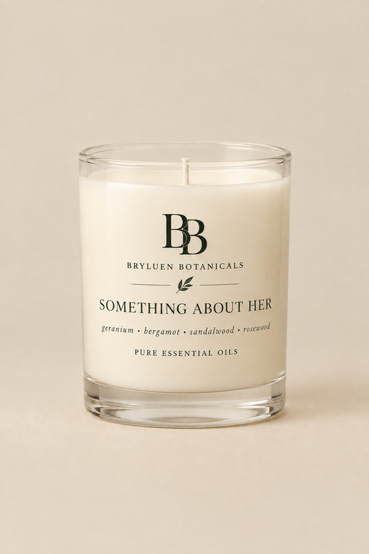 Something About Her candle by Bryluen Botanicals in clear glass, unlit, with minimal transparent label